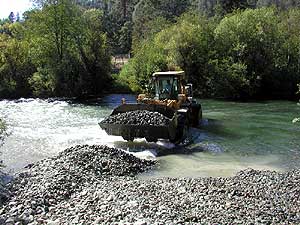 Placing Gravel in River