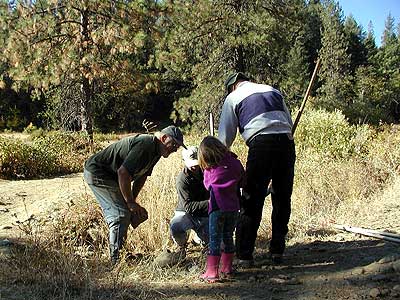 Trail Volunteers Installing Sign